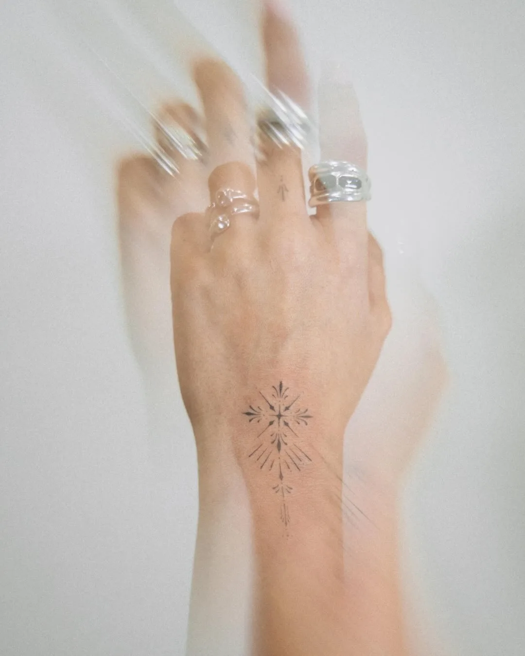 Ornamental fine line tattoo on hand — Sinkply Zürich