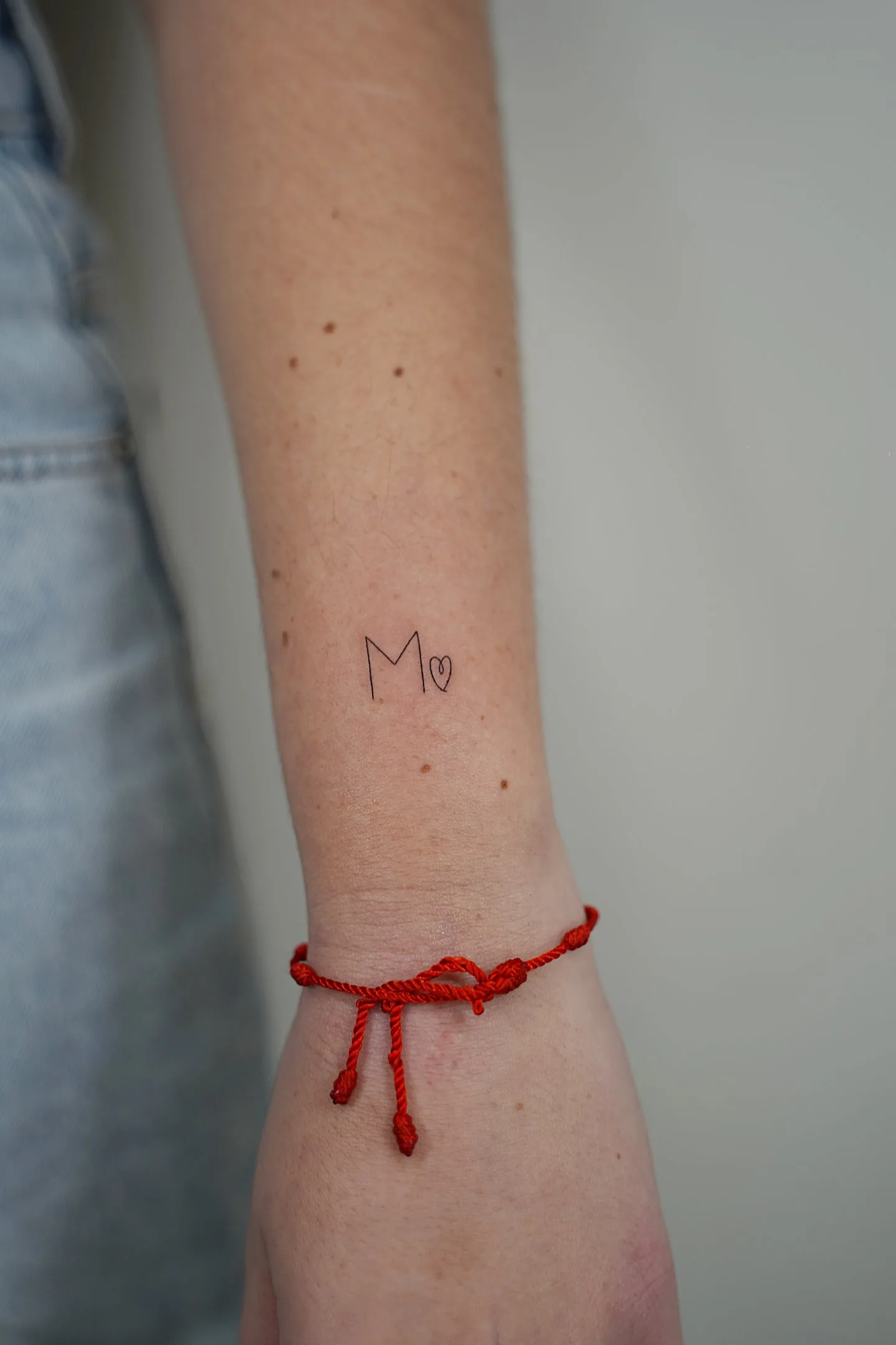 Handgeschriebenes Fine Line Tattoo — Sinkply Zürich