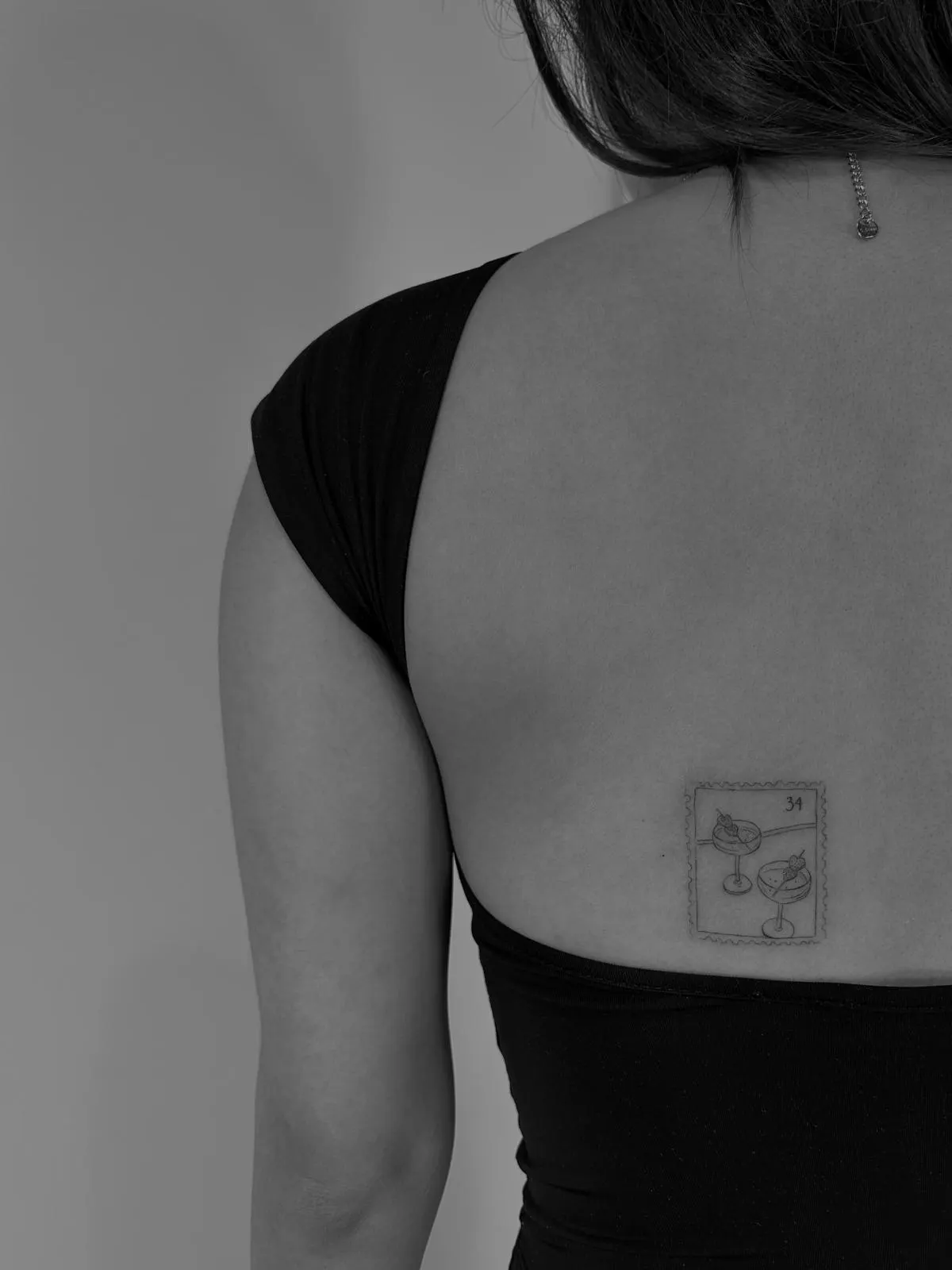 Beloved fine line lettering close-up with Second Skin patch