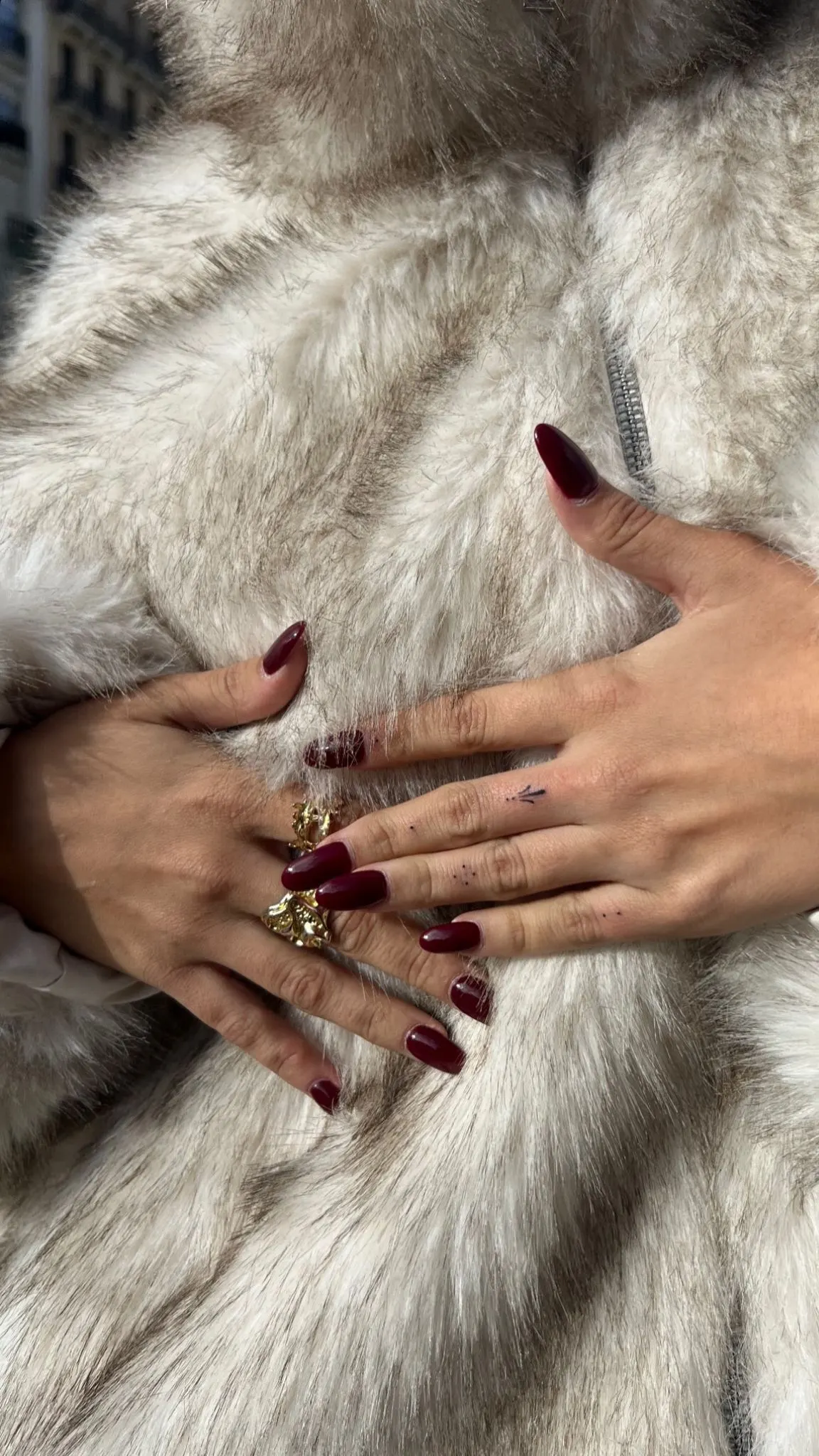 Mini fine line finger tattoo with fur coat luxury editorial
